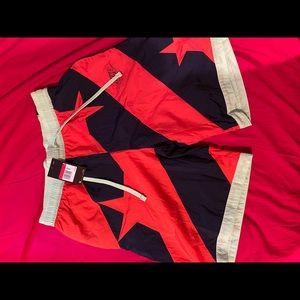 Nike loose fit swim shorts with star design